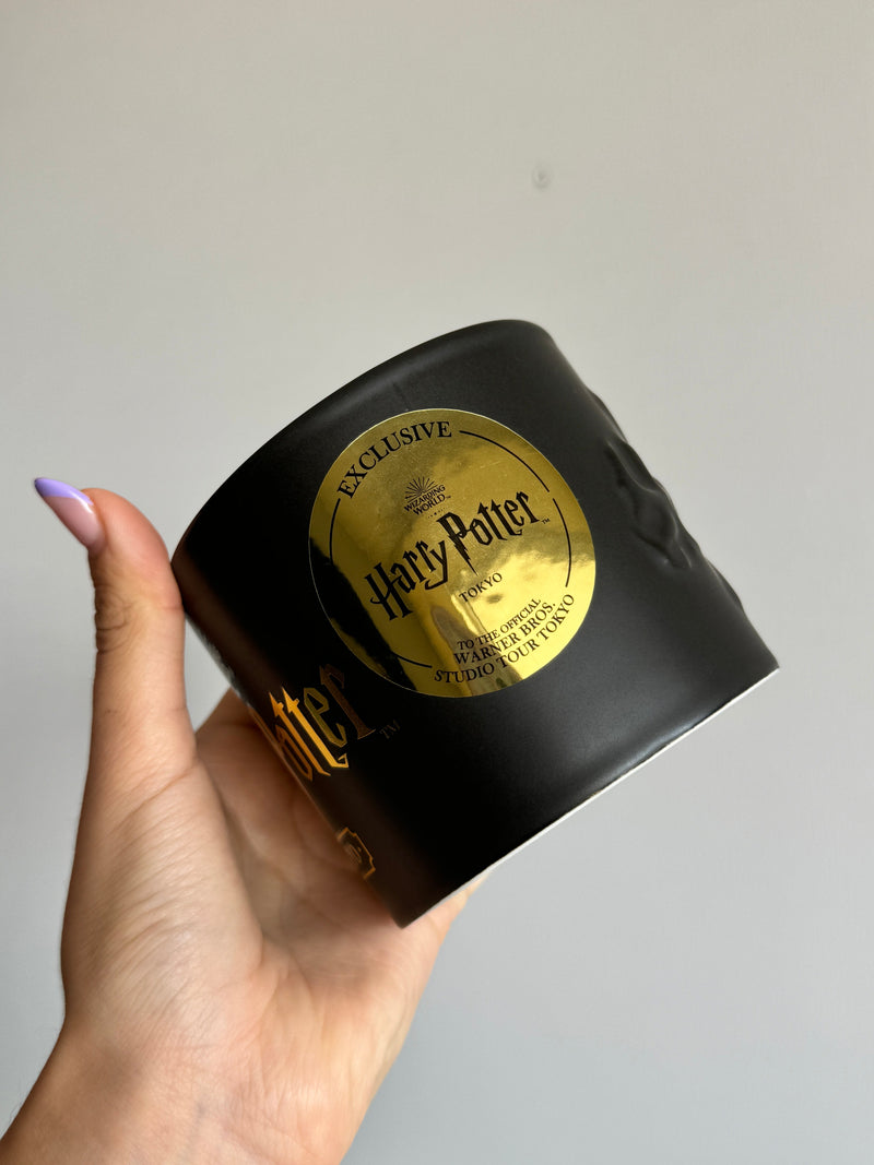 Caneca preta de Harry Potter Tóquio